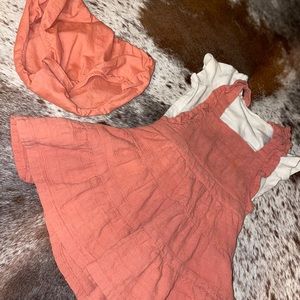 Coral dress with cream shirt sleeve